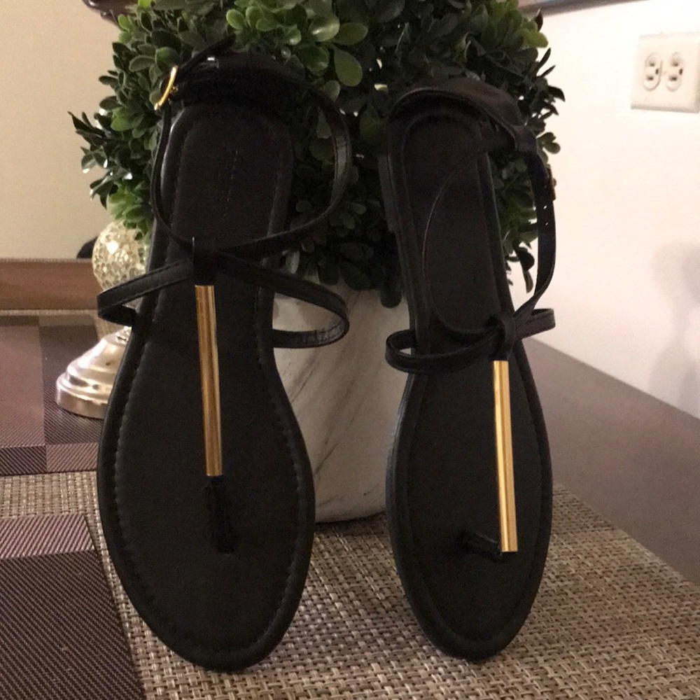 Chic Black Flats with Gold Bar Accent